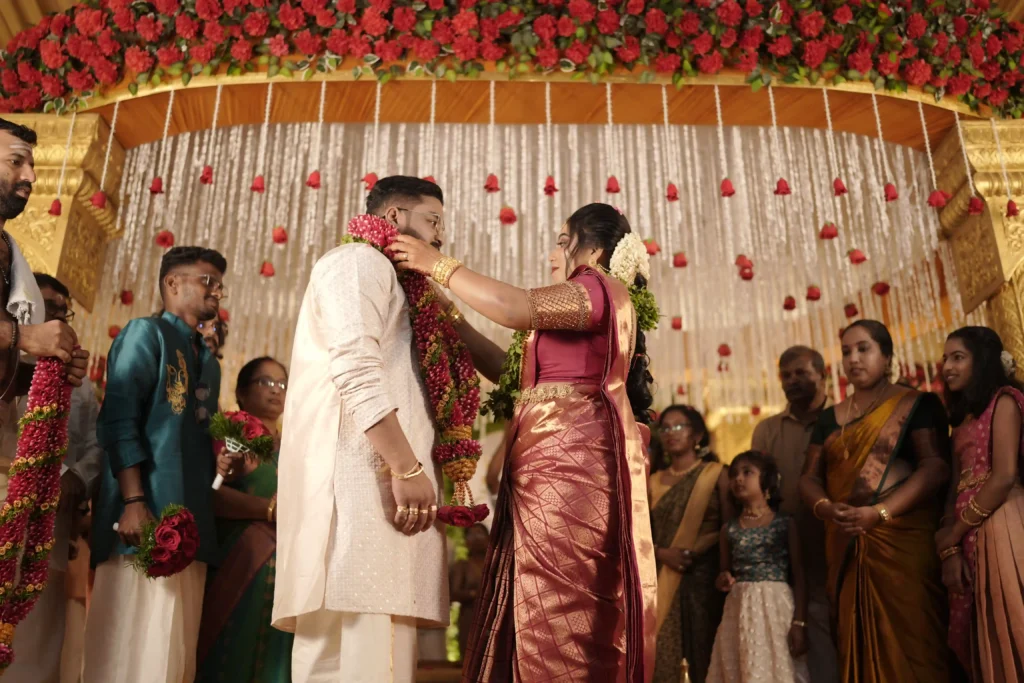 Bride and groom garland exchange wedding